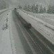 La A2 ad Airolo. Nevica ancora intensamente (immagine webcam DT)
